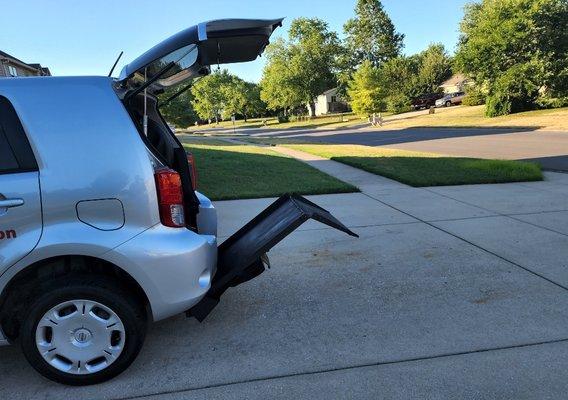 Wheelchair vehicle with ramp.