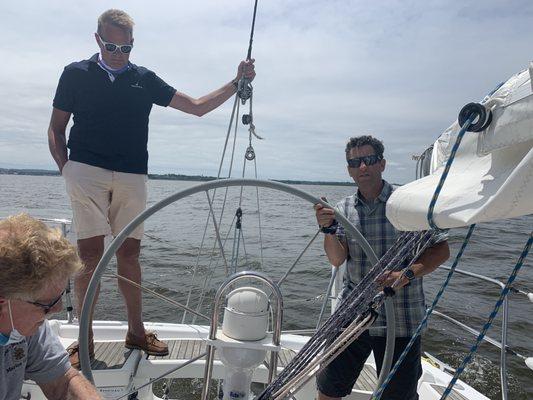 Taking the wheel at the sea trial.