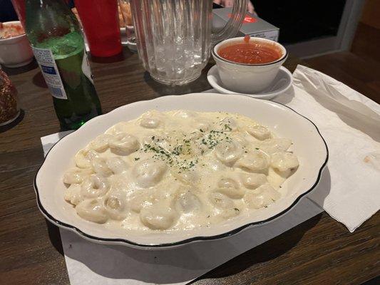 Angelina's cheese Tortellini w/ white sauce and red sauce on side