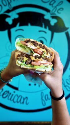 It's time to upgrade your lunch game with Sophia's Cafe Chopped Cheese Sandwich! Our Chopped Cheese is made with juicy beef, gooey cheese, a