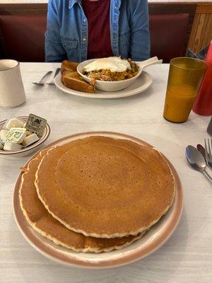 Pancakes in the foreground, the Farmers Skillet in the background