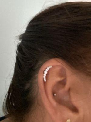 Right Ear:  Helix Piercing & Conch Piercing