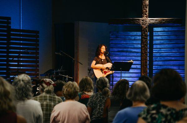 Our very own Bethany Wilson leading our ladies in morning worship!