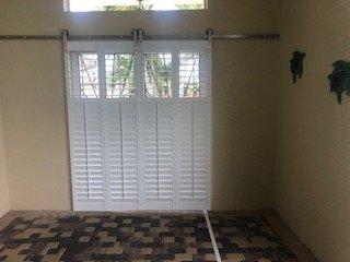 BARN DOOR APPLICATION ----- ON FRONT DOOR WITH PLANTATION SHUTTERS