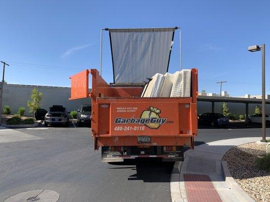 Mattress removal and disposal by Garbage Guy- world's best junk removal service.     Mesa, AZ