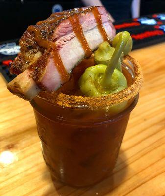 Our famous Bloody Moe topped with a Smoked Rib