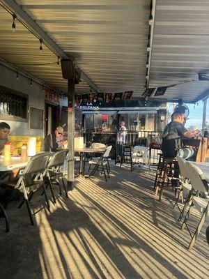 Taco truck view from the seating area