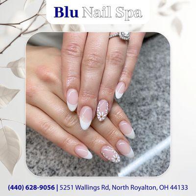 Book your appointment today and let our nail artists create the perfect white flower nail art for you!