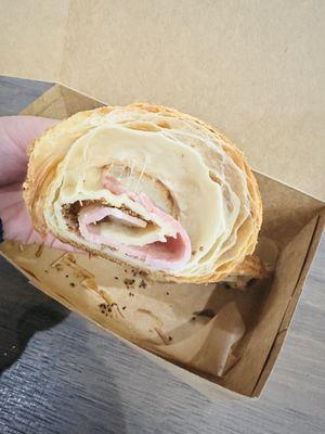 Under proofed ham and cheese croissant