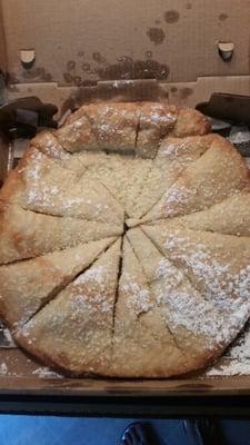 Fried dough with powdered sugar