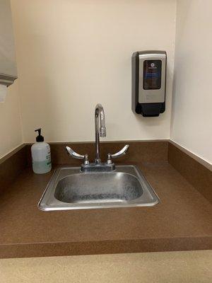 Sink in patient/exam room could use some attention