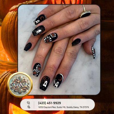 Dare to embrace the darkness? Our spider nail design is here to spin some chills into your Halloween style!