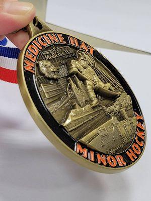 See us for your large quantity of custom  medals or golf bag tags.