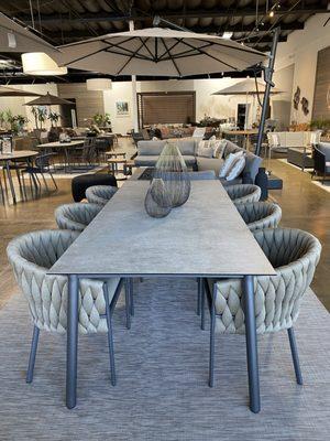 Presidio large dining table paired with Palisades dining chairs.