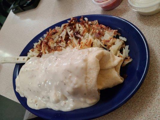 Breakfast burrito covered with sausage gravy & hash browns -- Hubby loved it!