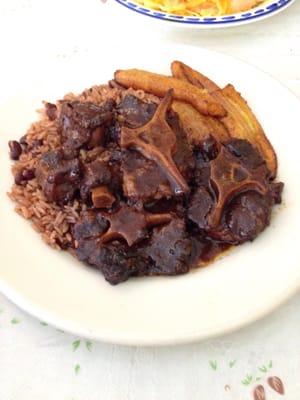 Oxtails rice and peas sweet plantain... Good food. Rice spicy