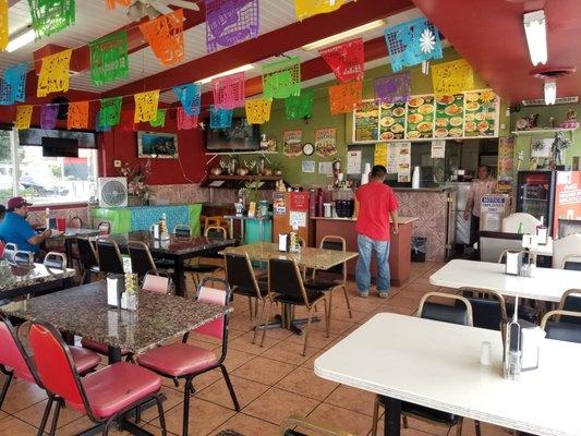 Front of the restaurant. It's a clean place but the furniture is a bit random and outdated.