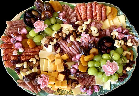 Our Signature Charcuterie Board. Available in small, medium and large sizes. Perfect for any occasion. Order yours today!