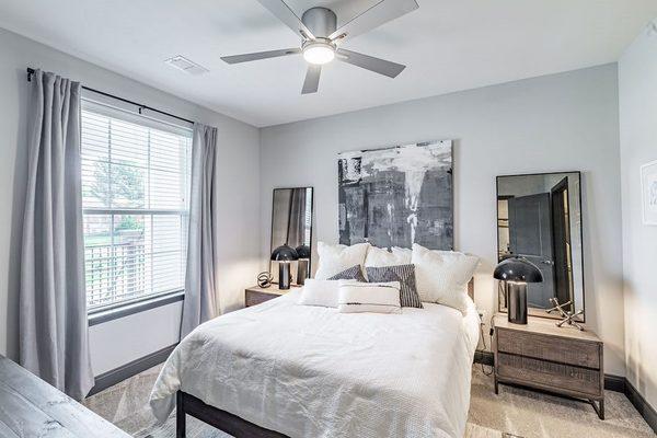 Bedroom with Ceiling Fan at The Louis