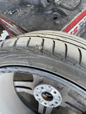 the $85 used tire he sold me with previous damage - old plug