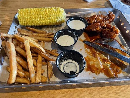 Chipotle chicken crispers, fries, corn on the Cobb, ranch dressing