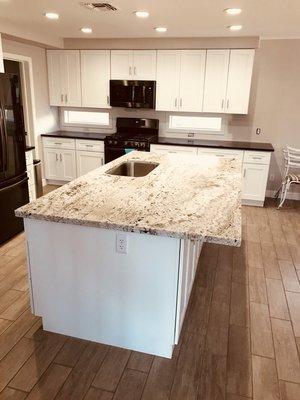 black and white combination granite kitchen