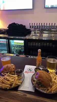 Smash burgers and fries at the bar