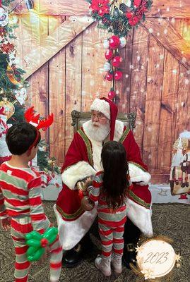 Love this candid shot Greg took with the Photobooth of kids interacting with Santa.