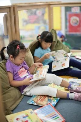 LACS preschoolers reading quietly in the loft area