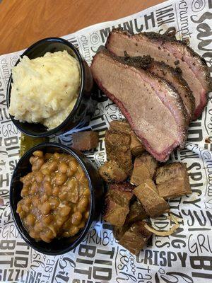 Brisket, pork belly burnt ends, beans and twice baked tater casserole