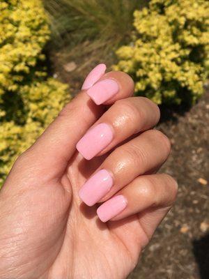 A super pretty pink, in a square round shape using the dipping powder