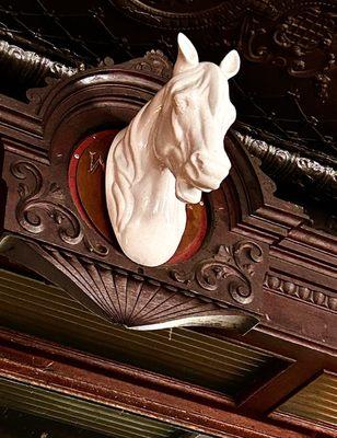 White Horse over the bar. I bet he's heard a story or two...