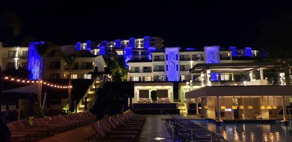 View of the hotel looking up from the pool.