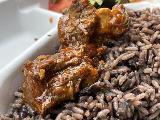 The oxtails. The rice. The fresh salad on the side. Perfection.