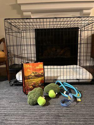 Training crate for dogs, toys for dogs, leach and a collar.