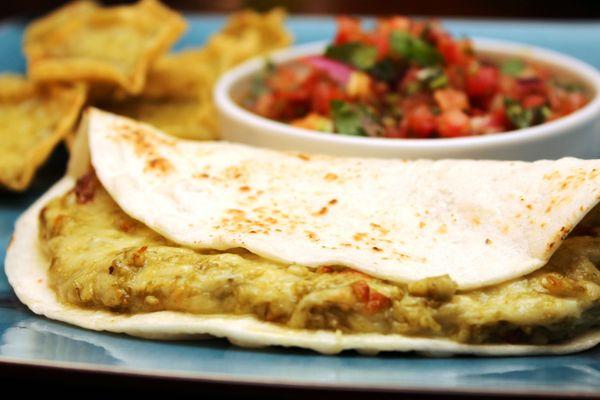 Queso con Poblano - Poblano Cheese. Melt in tortillas to make quesadillas or add to a bed of chips and melt in oven or MW to make Nachos.