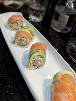 Tiger -  spicy crab meat, tobiko, scallop topped with salmon and avocado