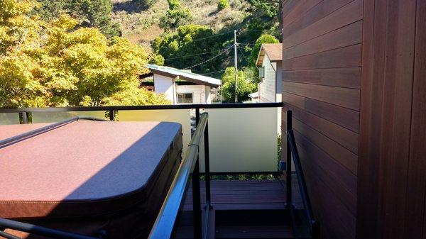 Privacy wall, deck, stairs, and glass railings by Jeremy at Elite Bay Area.