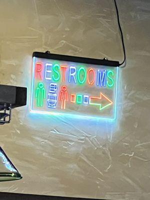 Colorful restroom sign! Even the bathrooms are festive!