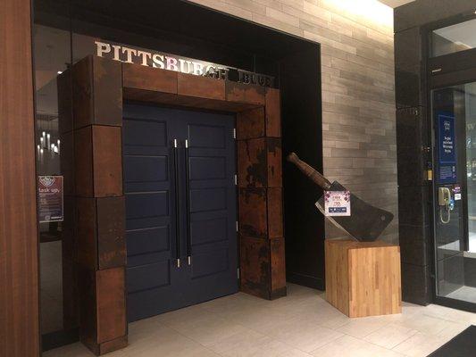 This is the entrance to Pittsburg Blue. They're open for take out, and will deliver to your room at the Hilton!