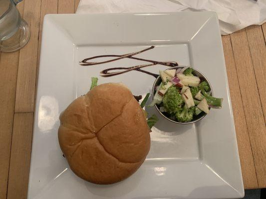 Mac daddy burger with a side of broccoli salad.