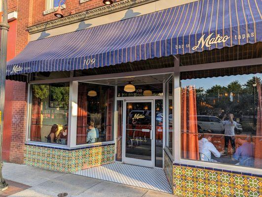 Outside. Storefront. Main front entrance. We parked for free in the city parking lot behind the restaurant. Enter via Ramseur St.