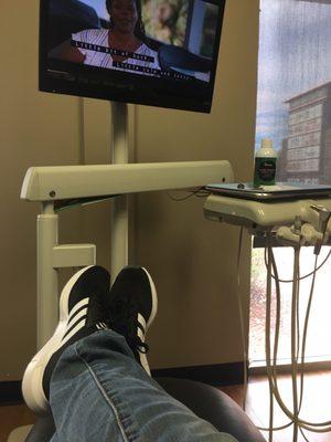 Exam room with TV and windows