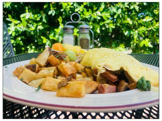 Spinach Chicken Omelet x potatoes and fruits.