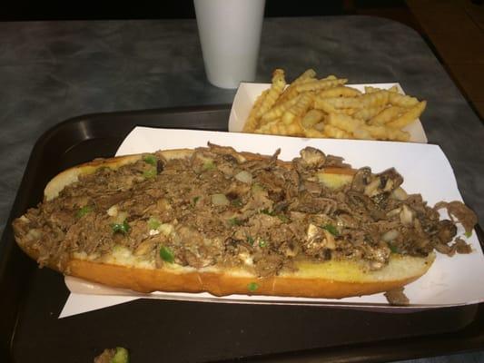 10" Cheesesteak with peppers, onions and mushrooms and side of krinkle cut fries.