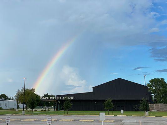 A beautiful rainbow above the church.