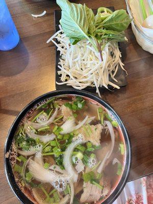 Fresh sprouts, lime and jalapeños. Beef shank pho