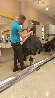 Nathan getting hair cut by Mark.