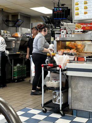 This lady will be happy to serve you up attitude and an eye roll with your food.