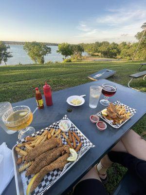 Outside seating with lake view. Cold beer and great food.